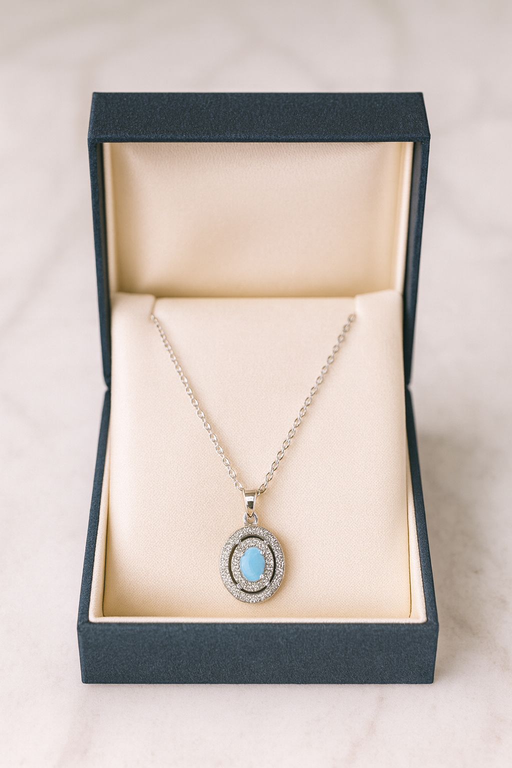Azure Glow Oval Pendant – Blue Stone & Crystal Artificial Jewellery